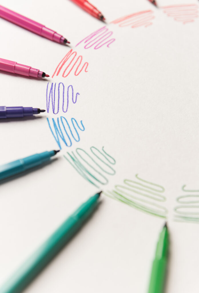 circle-with-different-colorful-purple-strokes-painted-with-markers-white-paper-gradient-colorful-strokes-copy-space-logo-advertisement