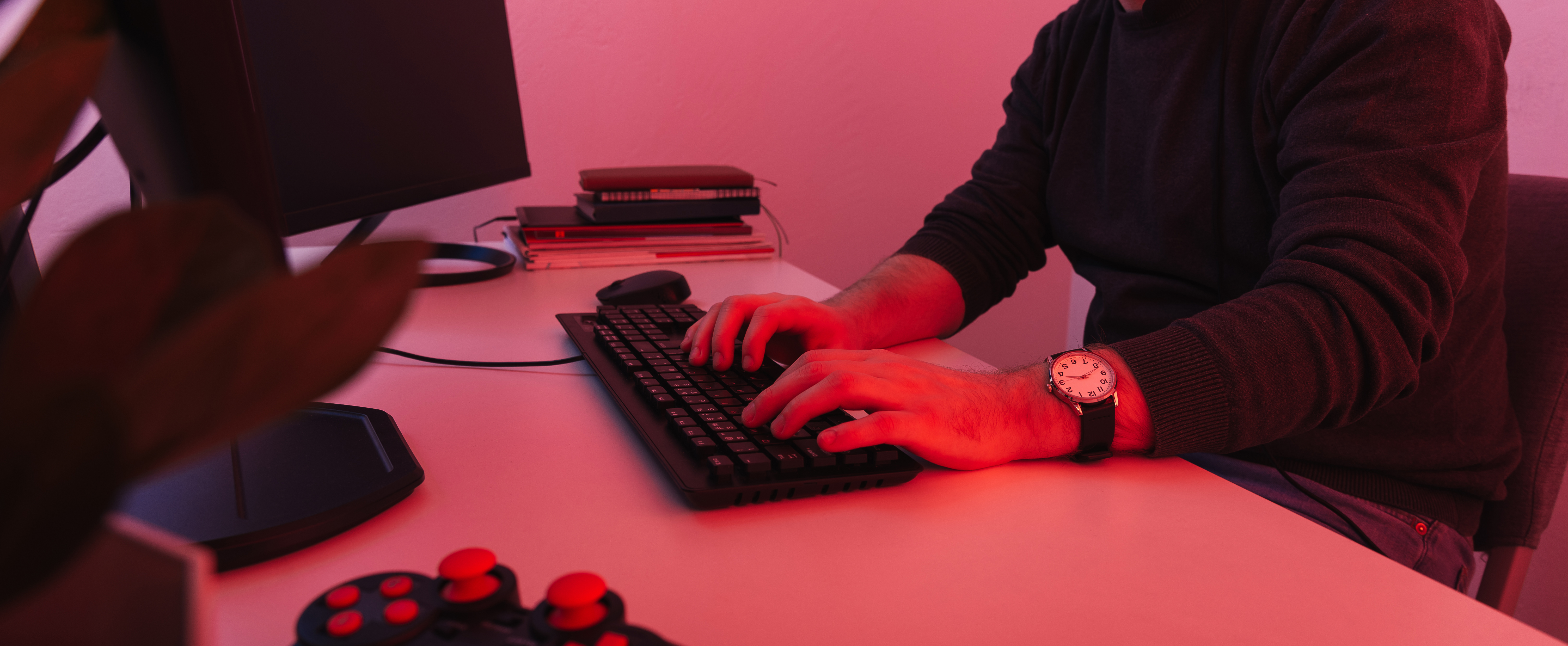 panorama-photo-man-working-typing-computer-office-red-light-shot